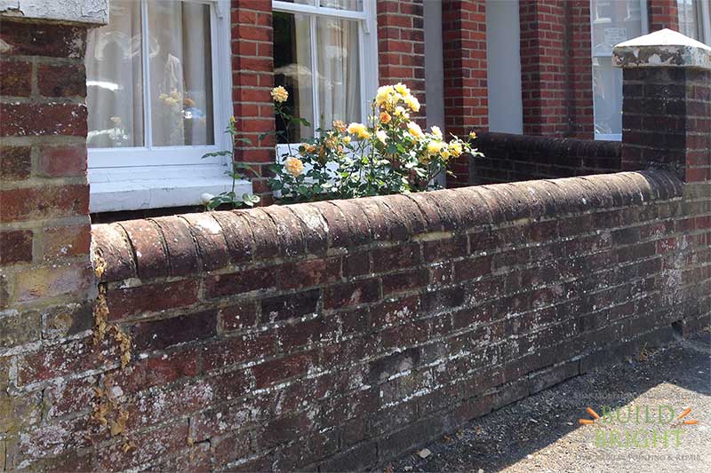 Victorian garden wall lime mortar repoint and pillar cap repair winchester before