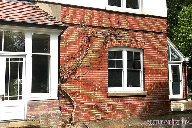 Victorian garden wall lime repointing